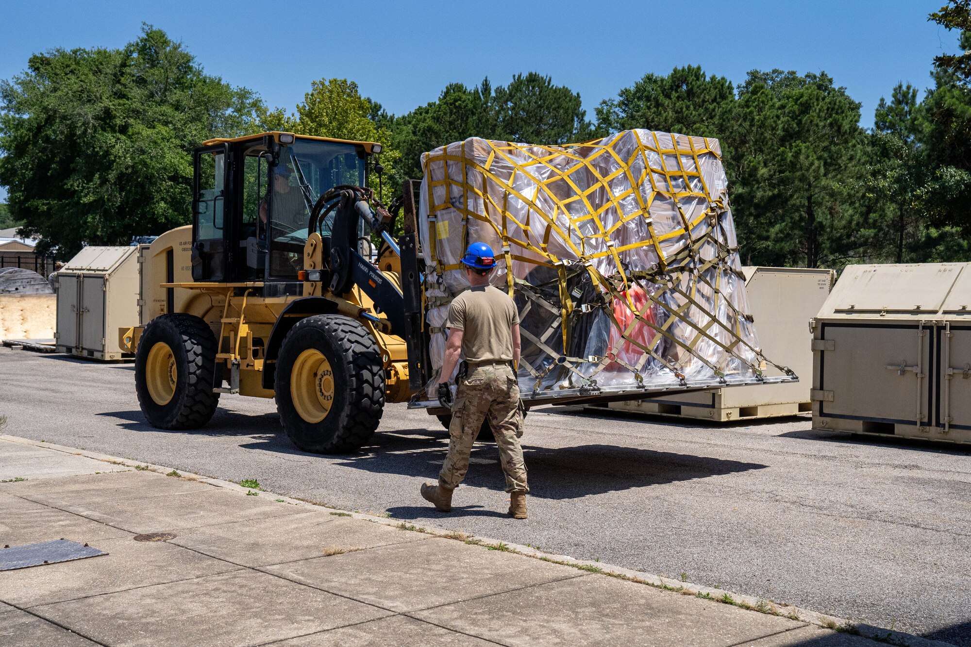 Cable supplies are brought out for placement on a flatbed truck at the 85th Engineering Installation Squadron, Mississippi, May 20, 2024.