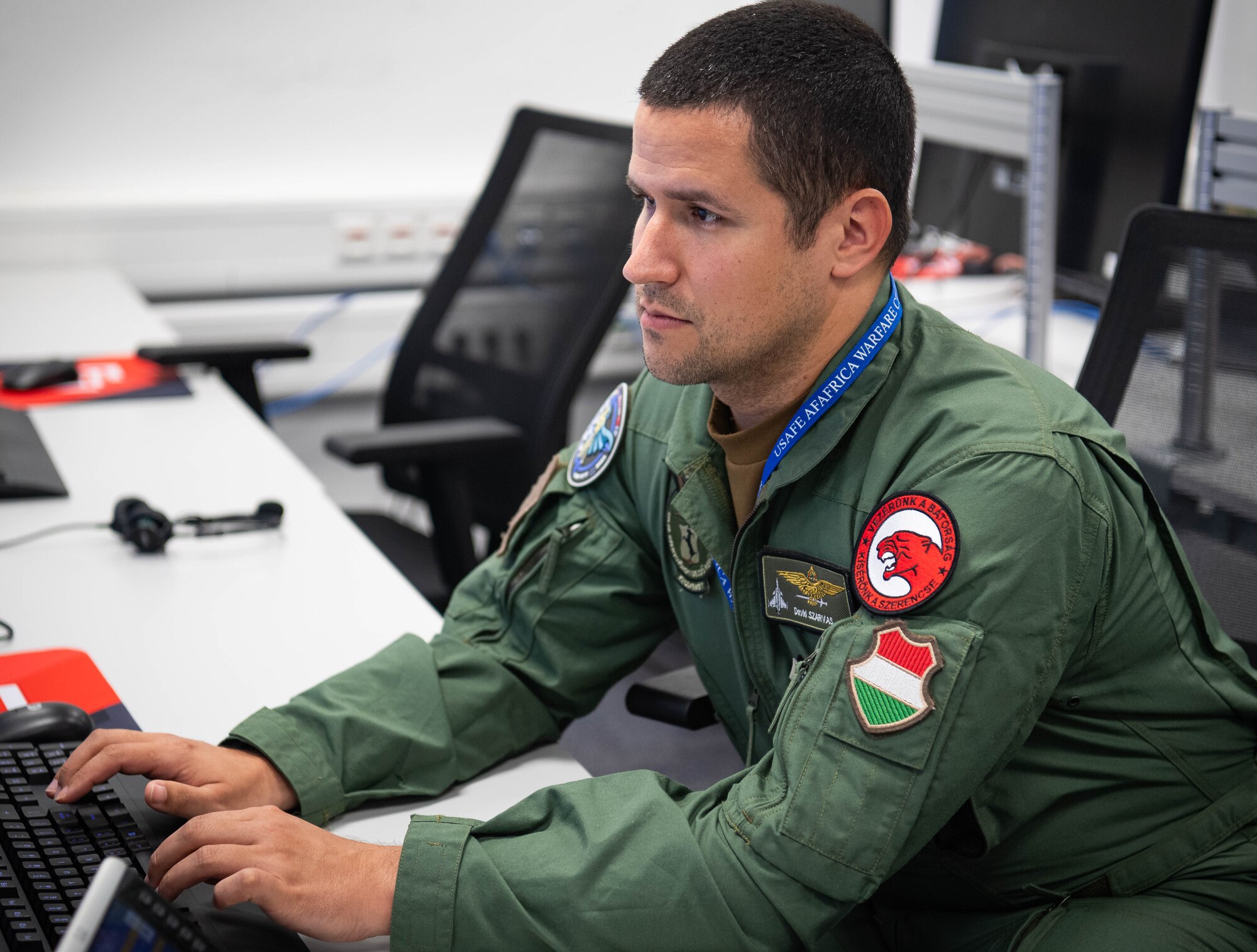 Hungarian Air Force 1st Lt. David Szarvas, 1st Fighter Squadron JAS-39 Gripen pilot, participates in exercise Ramstein Flag-Virtual 2024 at Einsiedlerhof Air Base, Germany, June 3, 2024. Ramstein Flag-Virtual 2024 is the first United States Air Forces in Europe – Air Forces Africa Warfare Center rehearsal for a live-fly exercise. The exercise scenarios included Combined Air Operations with Offensive Counter Air and Defensive Counter Air missions, while integrating fourth and fifth generation fighter aircraft and tactical command and control across 13 NATO countries. (U.S. Air Force photo by Senior Airman Jared Lovett)