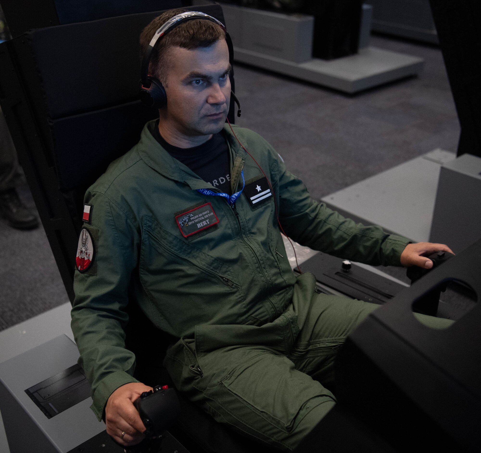 Polish Air Forces Maj. Bartlomiej Krygowski, 10th Fighter Squadron F-16 pilot, trains on a F-35 effects based simulator during exercise Ramstein Flag-Virtual 2024 at Einsiedlerhof Air Base, Germany, June 6, 2024. Ramstein Flag-Virtual 2024 is the first United States Air Forces in Europe – Air Forces Africa Warfare Center rehearsal for a live-fly exercise. The exercise enabled participants to receive an introduction of a live-flight mission and environment to achieve higher levels of effectiveness in a real world scenario. (U.S. Air Force photo by Senior Airman Jared Lovett)