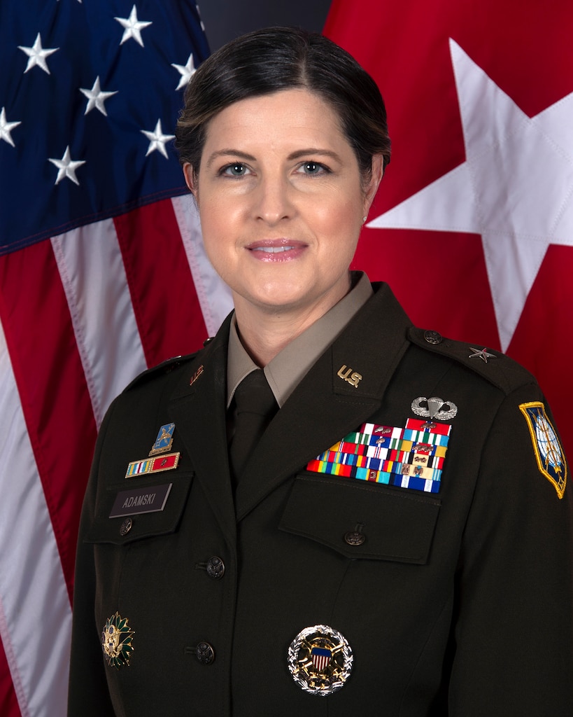 A photo showing a female U.S. Army officer wearing the Army Green Service Uniform with the rank of a brigadier general.