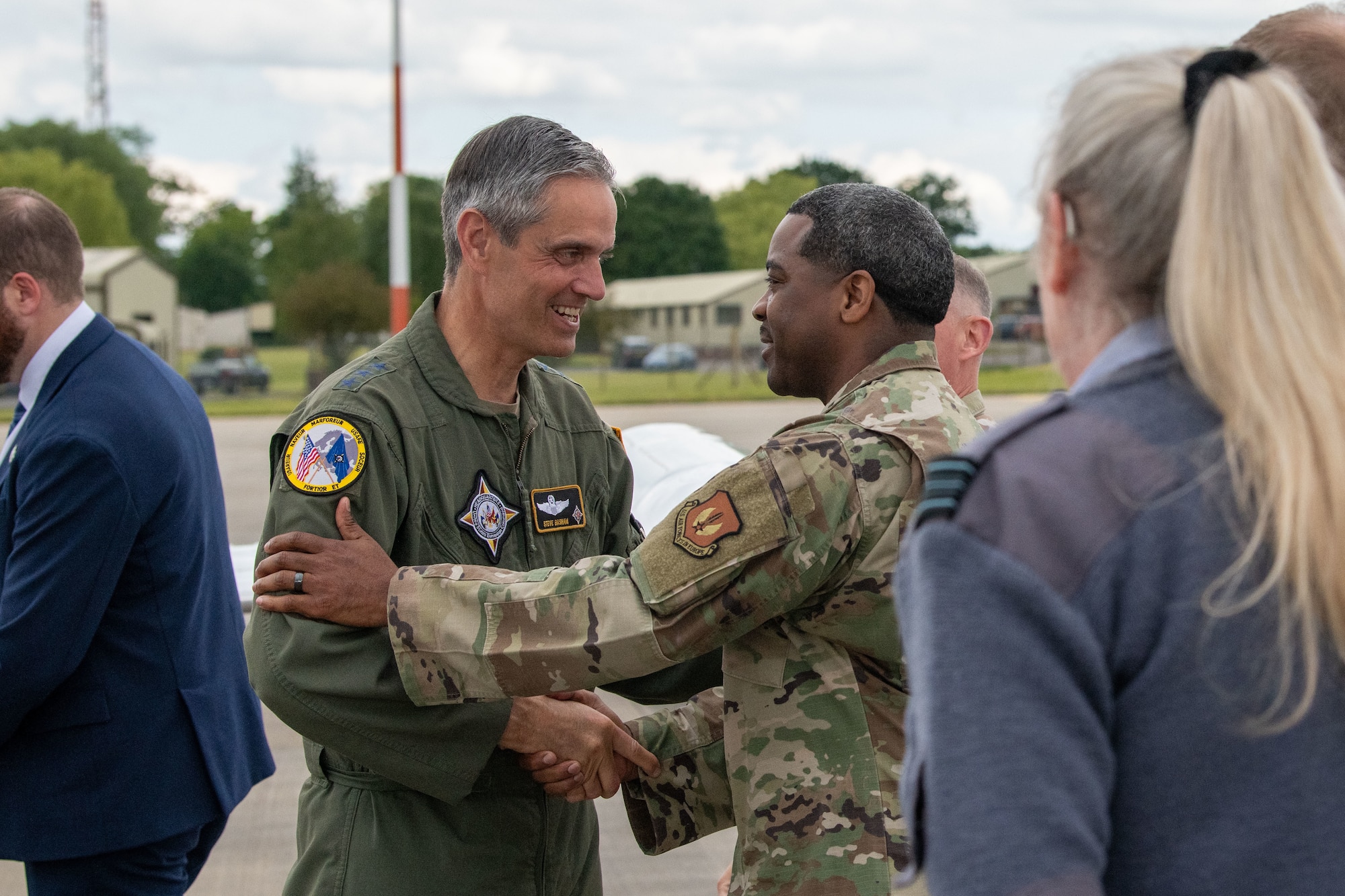 Airmen shake hands
