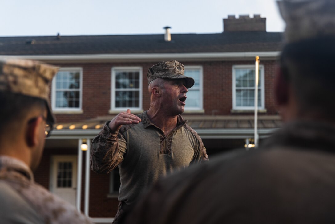 U.S. Marine Corps Sgt. Maj. Zane Moorman, sergeant major of II Marine Expeditionary Force Support Battalion (II MSB) speaks to the battalion following a 10K conditioning hike aboard Marine Corps base Camp Lejeune, North Carolina, May 16, 2024.  The hike was conducted in order to increase Marines and Sailors' abilities to effectively hike under a load while also strengthening unit cohesion and unit readiness. (U.S. Marine Corps photo by Cpl. Maurion Moore)