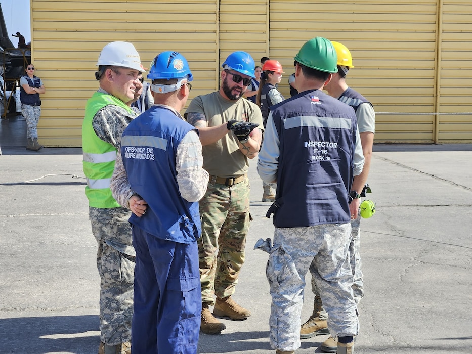 photo of Airmen from different country's working together