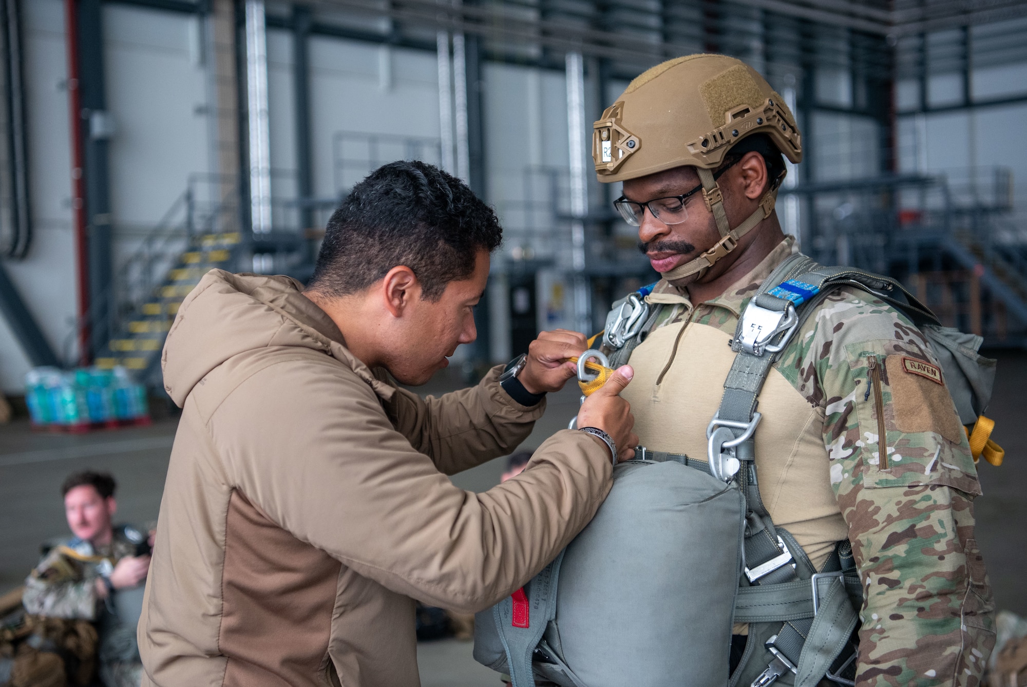 Inspector checks jumper's parachute