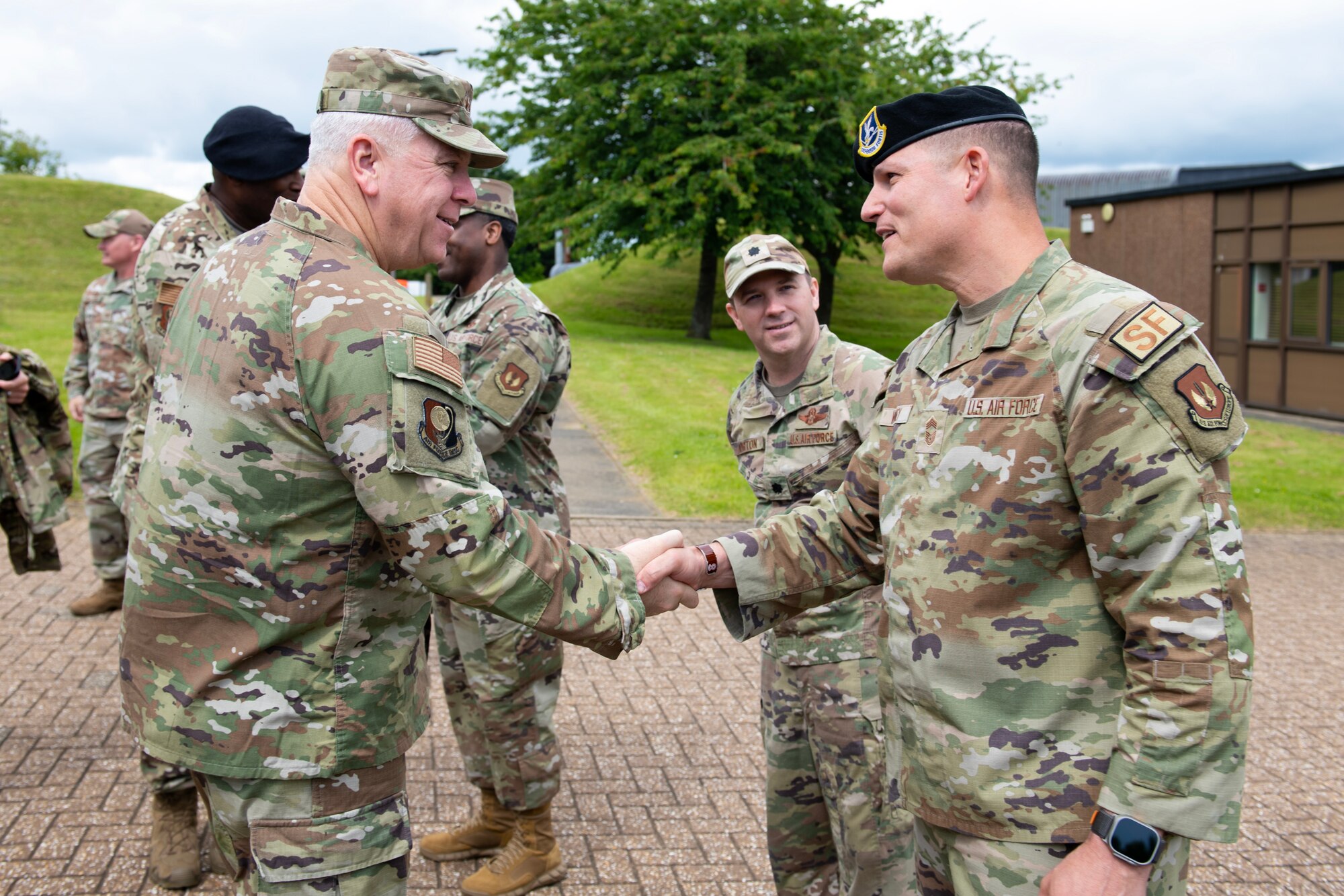 Airmen shake hands