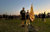 Garrison Commander Col. Reginald Evans and Command Sergeant Major, Sgt. Maj. Dan Durette represent U.S. Army Garrison Fort Eisenhower during a 5k run celebrating the 249th Birthday of the U.S. Army, June 14, 2024.