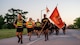 Soldiers from 369th Signal Battalion, 15th Signal Brigade, run in formation during Fort Eisenhower's 5k fun run celebrating the 249th birthday of the U.S. Army, June 14, 2024.