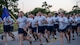 Airmen from 480th Intelligence, Surveillance and Reconnaissance Group run in formation during Fort Eisenhower's 5k fun run celebrating the 249th birthday of the U.S. Army, June 14, 2024.