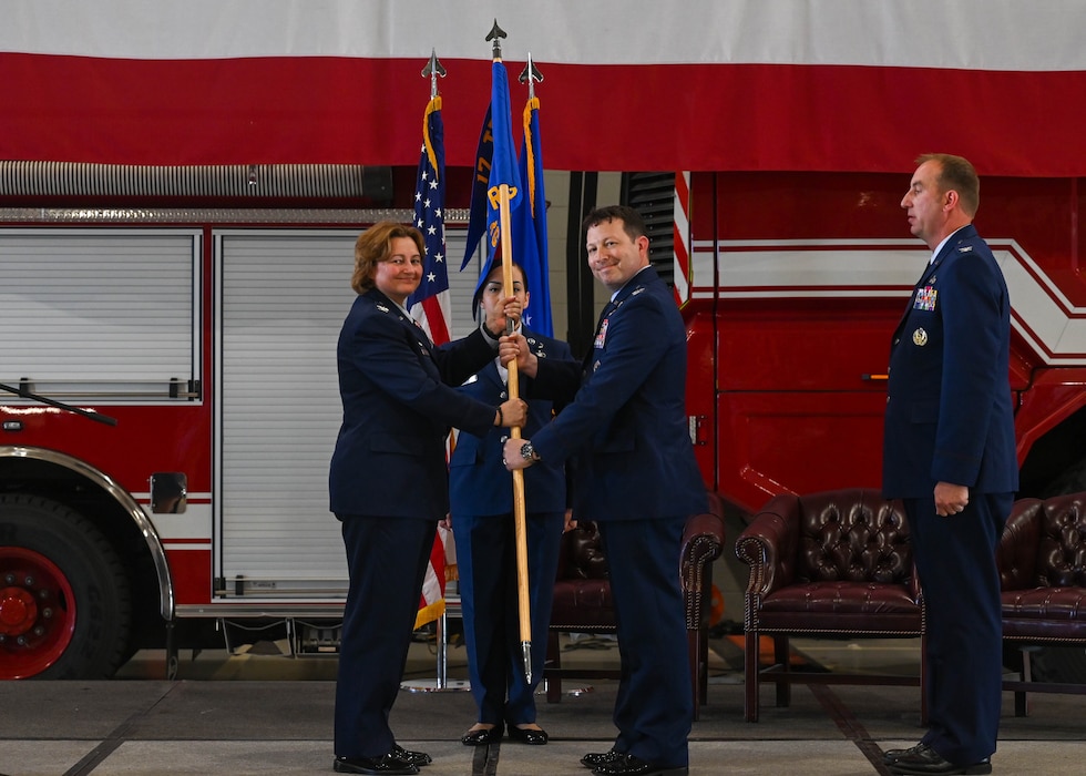 Members of the 17th Training Group salute U.S. Air Force Col. Jason Gerber, incoming 17th TRG commander, during the change of command ceremony at the Louis F. Garland Department of Defense Fire Academy, Goodfellow Air Force Base, Texas, June 14, 2024. The first salute represents the squadron welcoming its new commander. (U.S. Air Force photo by Senior Airman Zach Heimbuch)