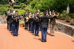 New York Army National Guard Soldiers of the 42nd Infantry Division band, led by Spc. Steven Fonti, perform a march during a ceremony welcoming King Willem-Alexander and Queen Maxima of the Netherlands to the New York State executive mansion in Albany, New York, June 12, 2024. The Dutch royals visited New York's capital and were hosted by New York Gov. Kathy Hochul on the third day of a four-day visit to the United States.