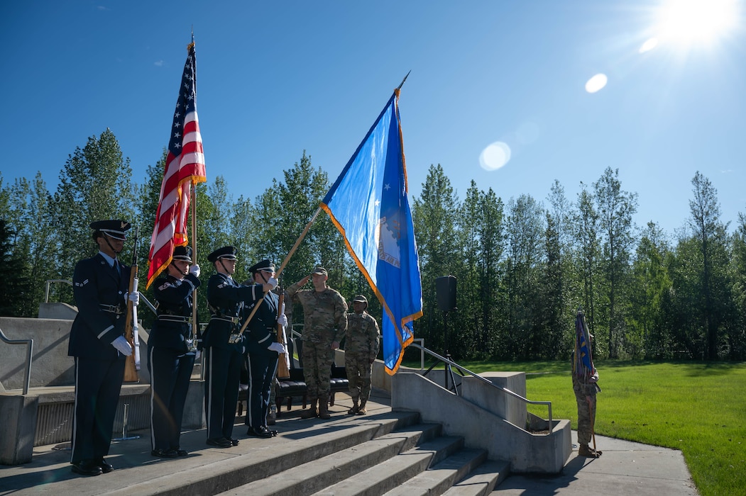 U.S. Air Force Honor Guardsmen stationed at Eielson Air Force Base, Alaska, performs a flag ceremony during a Command Chief Change of Responsibility, June 7, 2024.