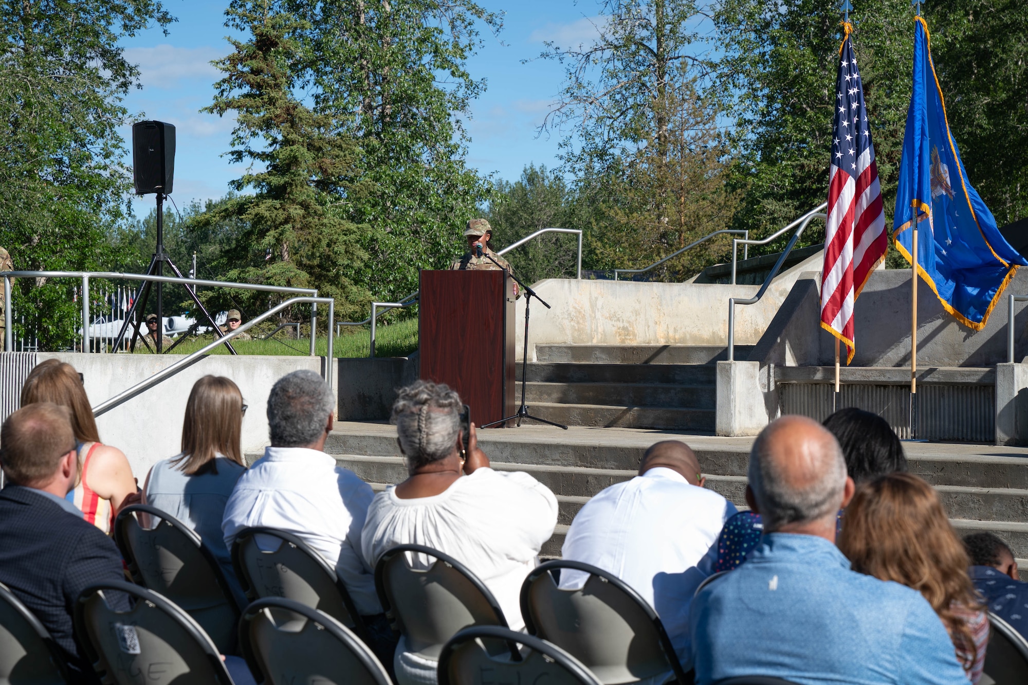 U.S. Air Force Chief Master Sgt. Sheronica Blandburg, incoming 354th Fighter Wing command chief, addresses the audience after the Command Chief Change of Responsibility ceremony at Eielson Air Force Base, Alaska, June 7, 2024.