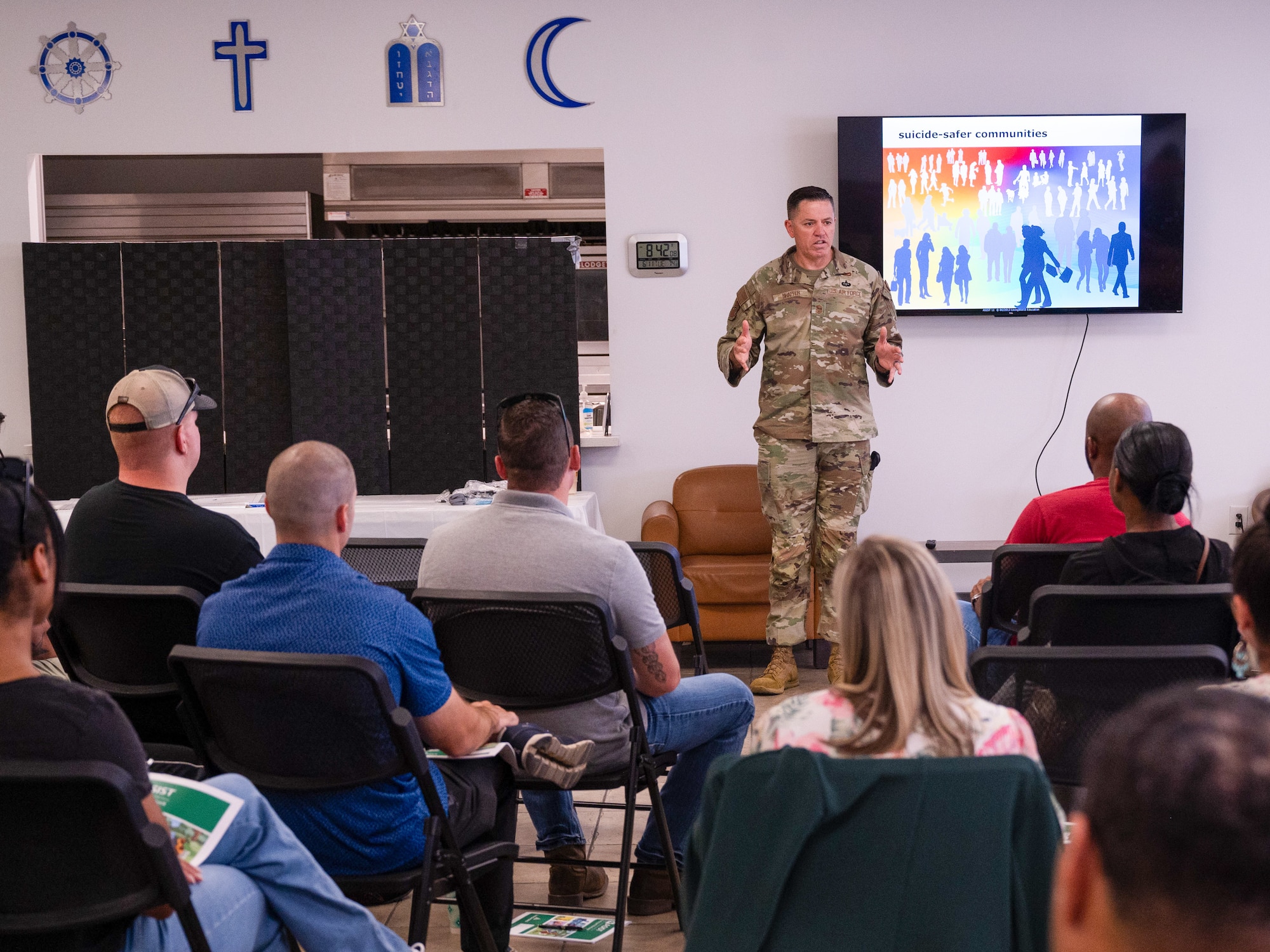 Chief Master Sgt. Jason Shaffer, 56th Fighter Wing command chief, speaks to Airmen at an Applied Suicide Intervention Skill Training workshop, June 11, 2024, at Luke AFB, Arizona.