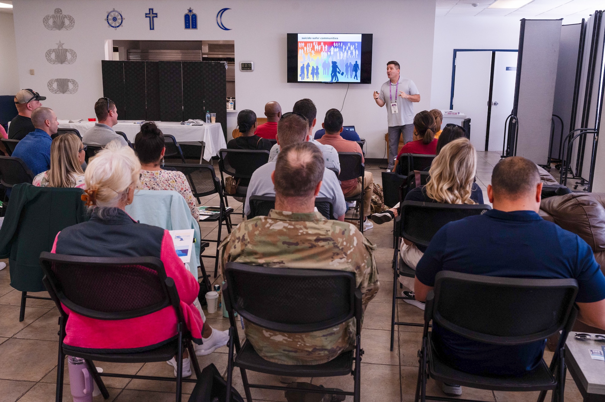 Michael Rhinehart, Applied Suicide Intervention Skill Training workshop trainer, speaks to Airmen, June 11, 2024, at Luke AFB, Arizona.