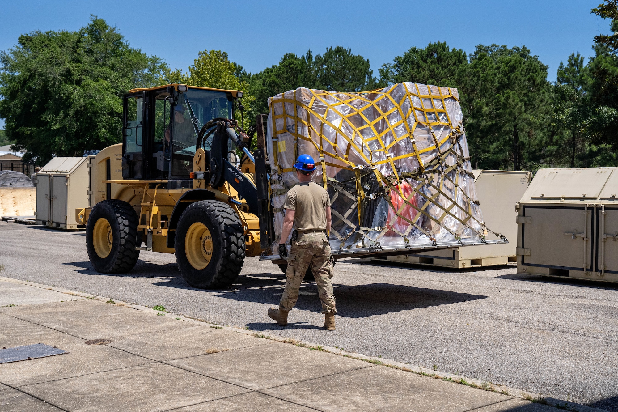 Cable supplies are brought out for placement on a flatbed truck at the 85th Engineering Installation Squadron, Mississippi, May 20, 2024.