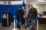 Daniel Dücker, Tennessee Valley Healthcare System executive director, Col. Jeffery Hambrice, U.S. Army Dental Health Activity-Fort Campbell commander, Dr. Donna Walls, TVHS chief of dental services, and Dr. Kennedy Germany, TVHS Dental Clinic local area supervisor, cut the ribbon to mark the official opening of the Taylor VA Dental Clinic on Fort Campbell Wednesday, June 12.