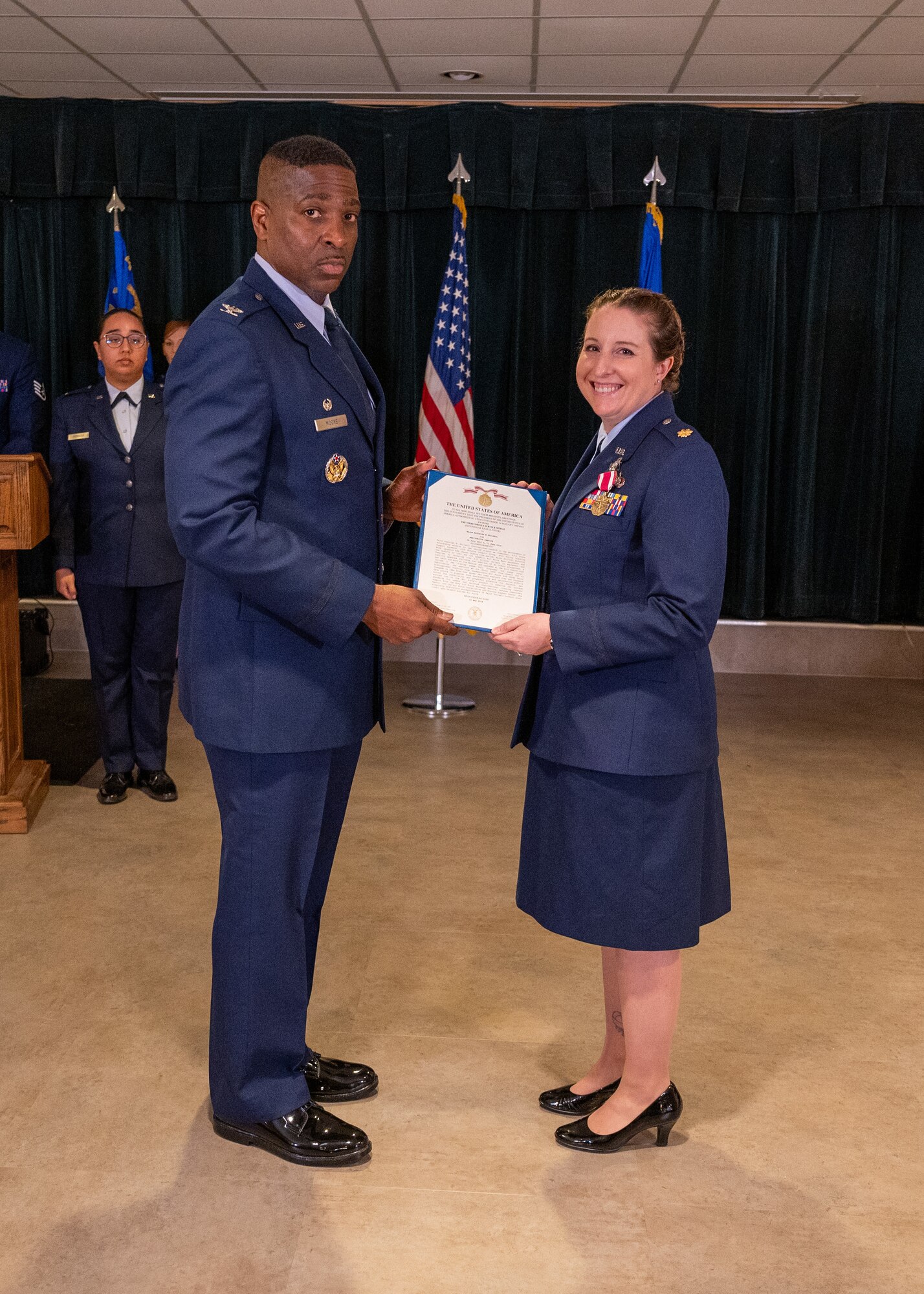 U.S. Air Force Col. Robert Moore (left), 47th Mission Support Group commander, presents the Meritorious Service Medal to Maj. Kayleigh Stilwell (right), 47th Force Support Squadron (FSS) commander, during the change of command ceremony at Laughlin Air Force Base, Texas, June 11, 2024. The Meritorious Service Medal was established as the counterpart of the Bronze Star Medal for the recognition of meritorious noncombatant service. (U.S. Air Force photo by Staff Sgt. Nicholas Larsen)