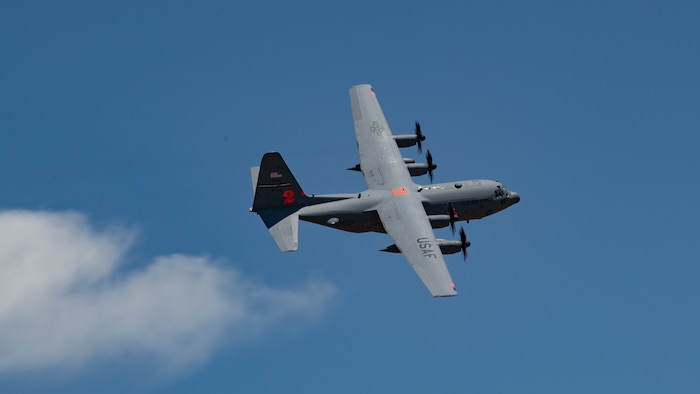 A military cargo aircraft in flight.