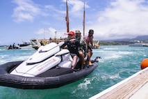 Marine Corps Base Hawaii Waterfront Operations personnel assist in the mooring of the Hokule’a during the 2024 Festival of the Pacific Arts and Culture (FestPAC) Wa’a Ceremony at MCBH, June 4, 2024. The visit consisted of a welcome ceremony, a tour of the Hokule’a and Iosepa, and a dinner after the Hokule’a and six of her sister wa'a moored at the MCBH Marina. For the first time, Hawaii will host the FestPAC, which serves as a platform for cultural exchange, celebration of indigenous artistry, and the promotion of regional solidarity among Pacific nations. (U.S. Marine Corps photo by Sgt. Julian Elliott-Drouin)