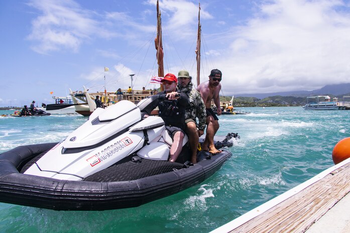 Marine Corps Base Hawaii Waterfront Operations personnel assist in the mooring of the Hokule’a during the 2024 Festival of the Pacific Arts and Culture (FestPAC) Wa’a Ceremony at MCBH, June 4, 2024. The visit consisted of a welcome ceremony, a tour of the Hokule’a and Iosepa, and a dinner after the Hokule’a and six of her sister wa'a moored at the MCBH Marina. For the first time, Hawaii will host the FestPAC, which serves as a platform for cultural exchange, celebration of indigenous artistry, and the promotion of regional solidarity among Pacific nations. (U.S. Marine Corps photo by Sgt. Julian Elliott-Drouin)