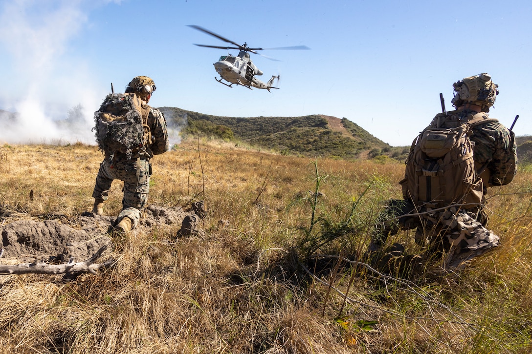 U.S. Marines with 1st Air Naval Gunfire Liaison Company, I Marine Expeditionary Force Information Group, prepare to exfiltrate on a UH-1Y Venom from Marine Light Attack Helicopter Squadron 169, 3rd Marine Aircraft Wing, I Marine Expeditionary Force, during a 1st ANGLICO certification exercise at Marine Corps Base Camp Pendleton, California, June 12, 2024. The 1st ANGLICO CERTEX assessed ANGLICO detachments across a broad spectrum of mission sets and core mission essential tasks in preparation for future operations. (U.S. Marine Corps photo by Cpl. Austin Gillam)