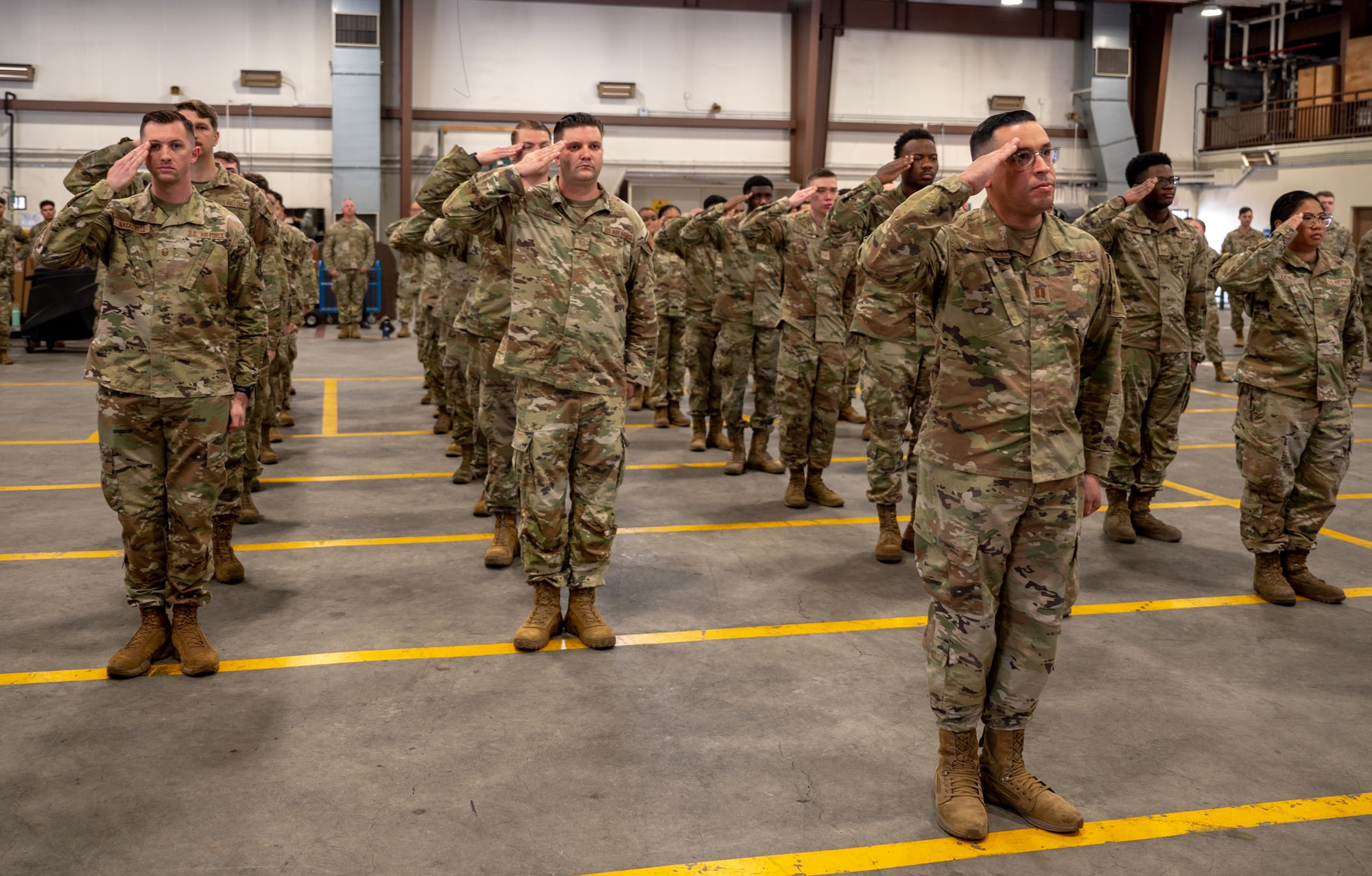 U.S. Air Force Airmen assigned to the 51st Logistics Readiness Squadron render a salute during a change of command ceremony at Osan Air Base, Republic of Korea, June 14, 2024. A change of command ceremony marks a smooth leadership transition, essential for preserving unit cohesion within the 51st Fighter Wing. (U.S. Air Force photo by Senior Airman Brittany Russell)