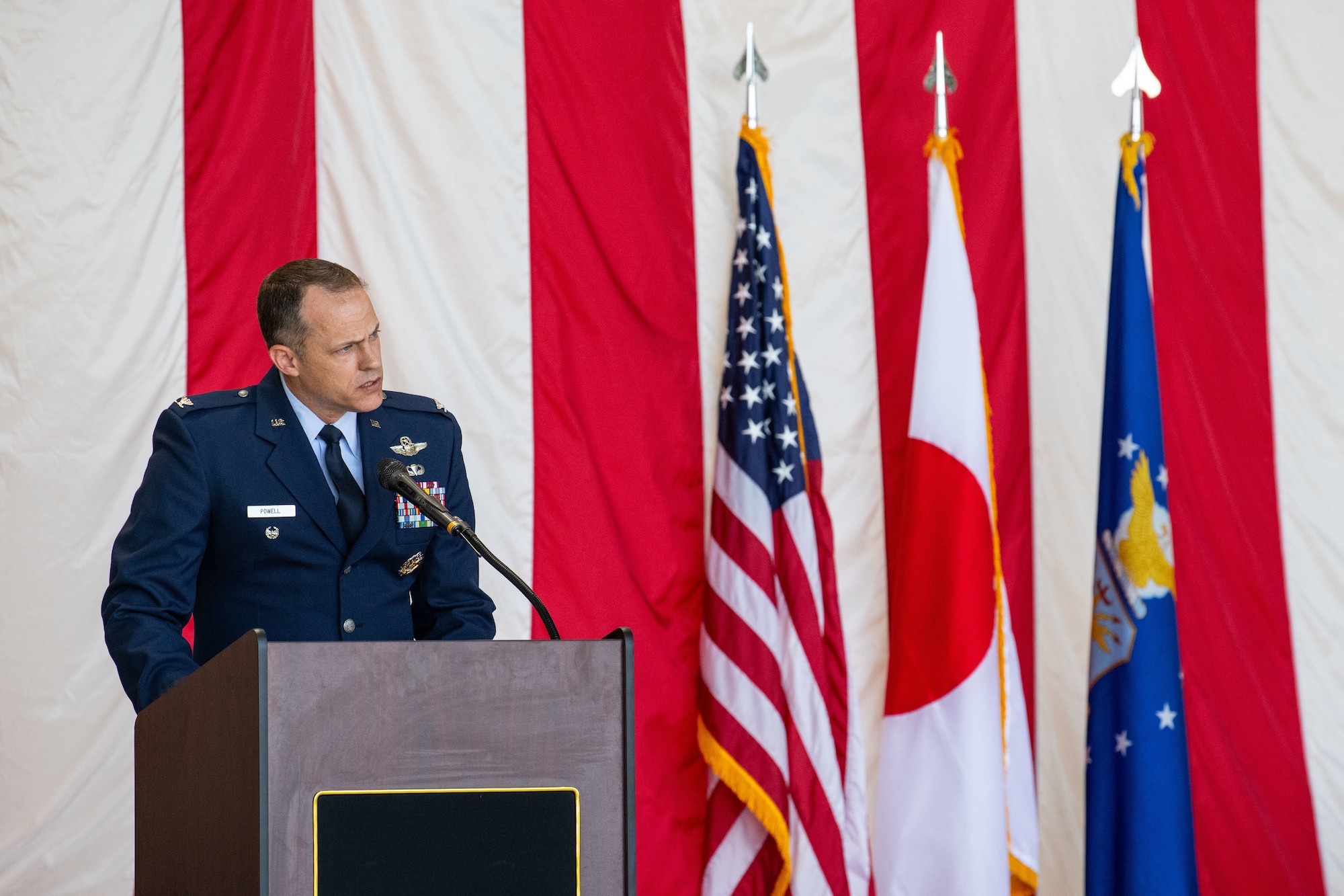 Airmen and civilians at a formal ceremony