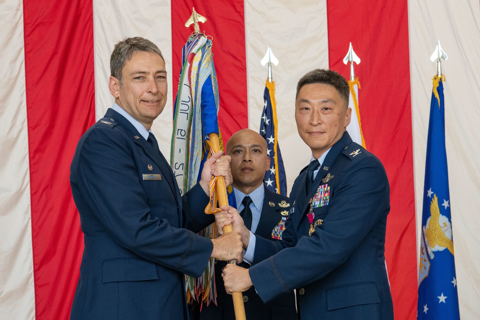 Airmen and civilians at a formal ceremony