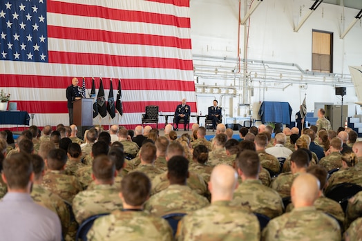 Lt. Gen. David N. Miller, Jr speaks to audience from a podium.