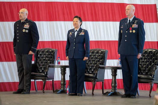  From the left, U.S. Space Force Lt. Gen. David N. Miller, Jr, Space Operations Command commander, Col. Phoenix L. Hauser, Space Delta 7 - Intelligence, Surveillance and Reconnaissance commander, and Col. Brett T. Swigert, former DEL 7 commander, sing the official U.S. Space Force song during a change of command ceremony.