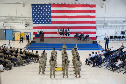  Guardians and Airmen stand in formation for the DEL 7 change of command ceremony.