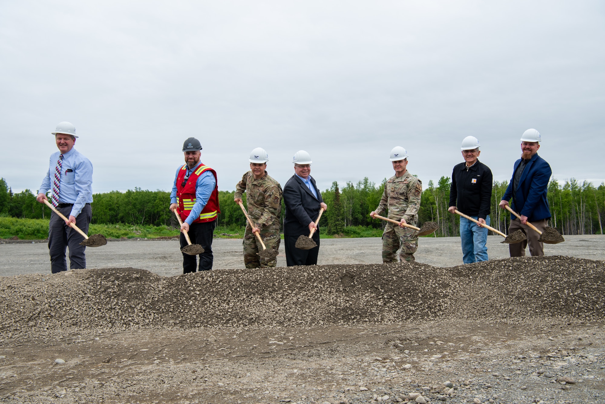 JBER leaders and project leads broke dirt at the construction site to symbolize the beginning of the project, while service members and civilians gathered to celebrate.