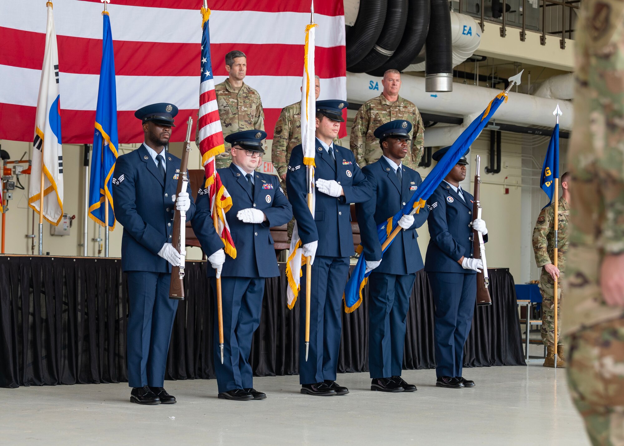 The 51st Fighter Wing Honor Guard presents the colors at a 51st Maintenance Group Change of Command Ceremony at Osan Air Base, Republic of Korea, June 12, 2024. The 51st FW Honor Guard services the entire Korean peninsula for details such as changes of command, promotions and retirement ceremonies. (U.S. Air Force photo by Staff Sgt. Aubree Owens)