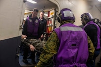 KATTEGAT STRAIT (June 14, 2024) Sailors transport a role player to medical during a mass casualty exercise aboard the amphibious assault ship USS Wasp (LHD 1), June 14, 2024, in the Kattegat Strait.