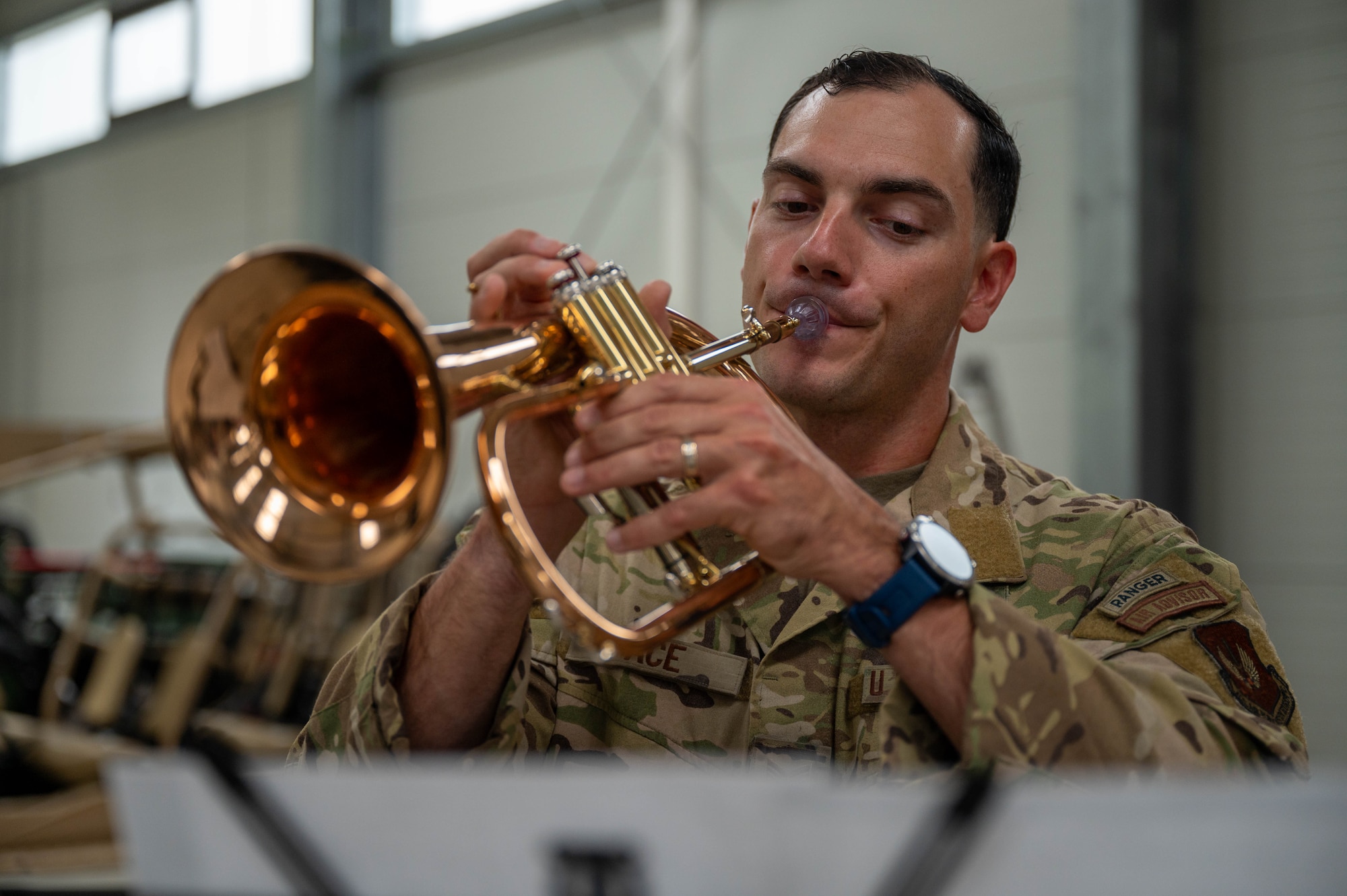 Joseph Pace plays an instrument in a squadron change of command.