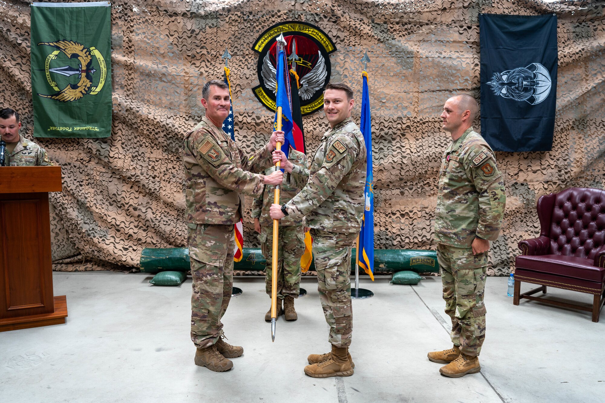 Squadron change of command ceremony passing of the guidon is performed.