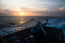 240408-N-GJ011-1708 RED SEA (April 8, 2024) An MH-60S Seahawk helicopter, attached to Helicopter Sea Combat Squadron (HSC) 7, is secured to the flight deck of the Arleigh Burke-class guided-missile destroyer USS Mason (DDG 87) as it transits the Bab al-Mandeb Strait, April 8. Mason is deployed to the U.S. 5th Fleet area of operations to support maritime security and stability in the Middle East. (Official U.S. Navy photo)