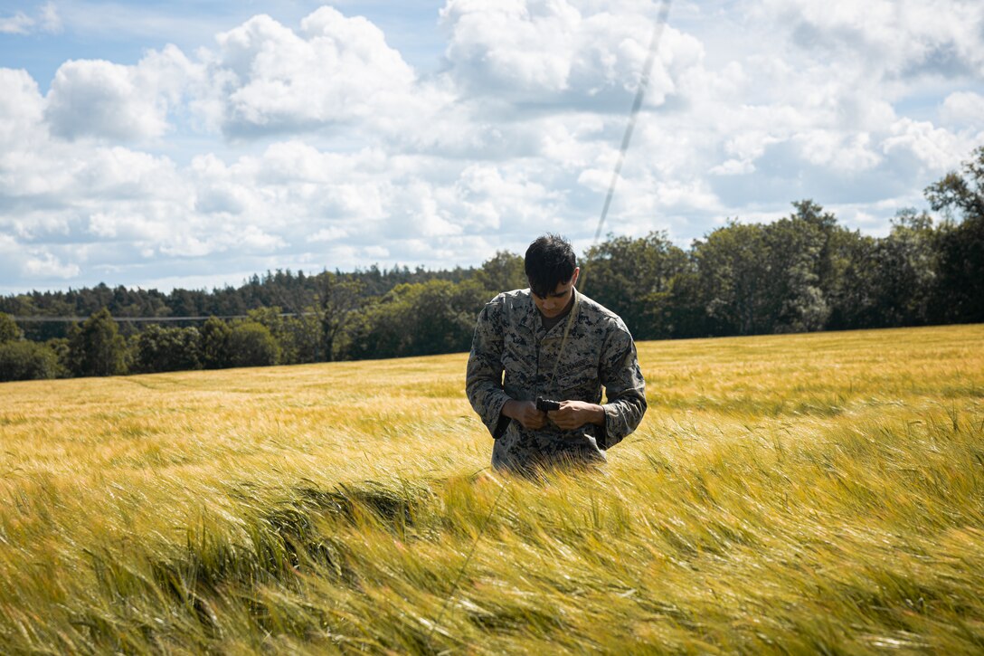 U.S. Marine Cpl. Alan Hernandez Vazquez, a transmissions system operator, with Combat Logistics Battalion 8, Combat Logistics Regiment 2, 2nd Marine Logistics Group, conducts communication operations during BALTOPS 24 as part of Marine Rotational Forces Europe 24.2 in Gotland, Sweden, June 13, 2024. MRF-E focuses on regional engagements throughout Europe by conducting various exercises, mountain-warfare training, and military-to-military engagements, which enhances the overall interoperability of the U.S. Marine Corps with allies and partners. (U.S. Marine Corps photo by Cpl. Jackson Kirkiewicz)