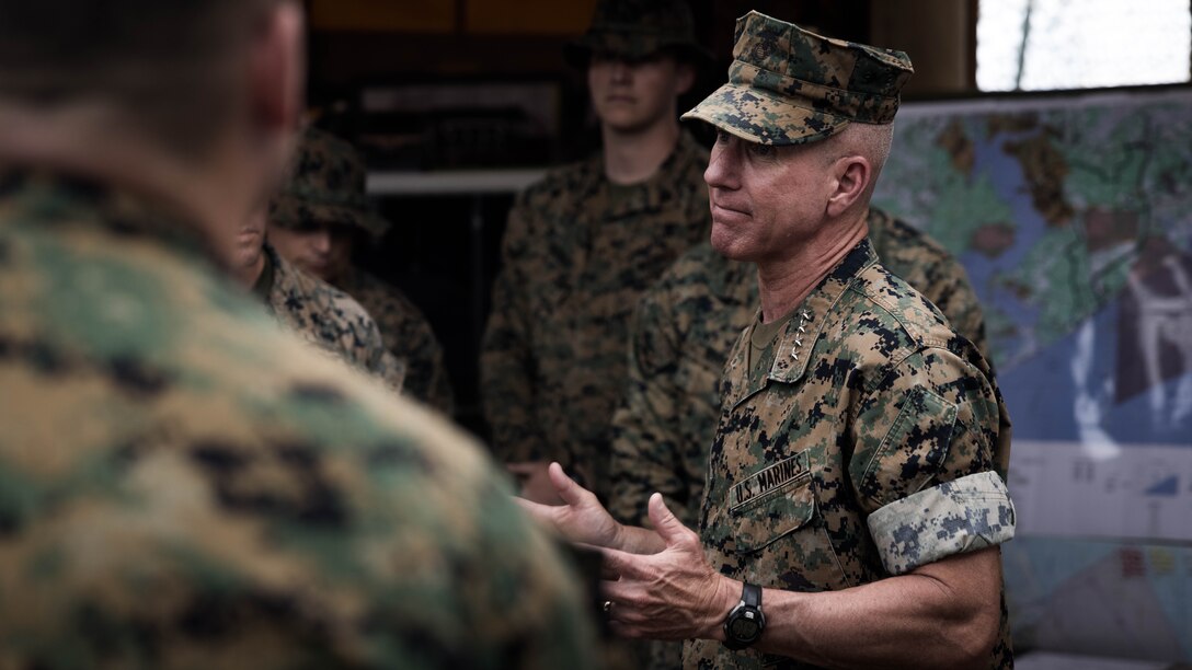 U.S. Marine Corps Gen. Eric M. Smith, the 39th Commandant of the Marine Corps,  speaks to Marines with 1st Battalion, 2d Marine Regiment, 2d Marine Division on Camp Lejeune, North Carolina, June 10, 2024. During his visit, Smith engaged with Marines from across 2d Marine Regiment and Camp Lejeune to discuss force design, quality of life as well as recognize some top-performing Marines. (U.S. Marine Corps photo by Cpl. Noelia Vazquez)