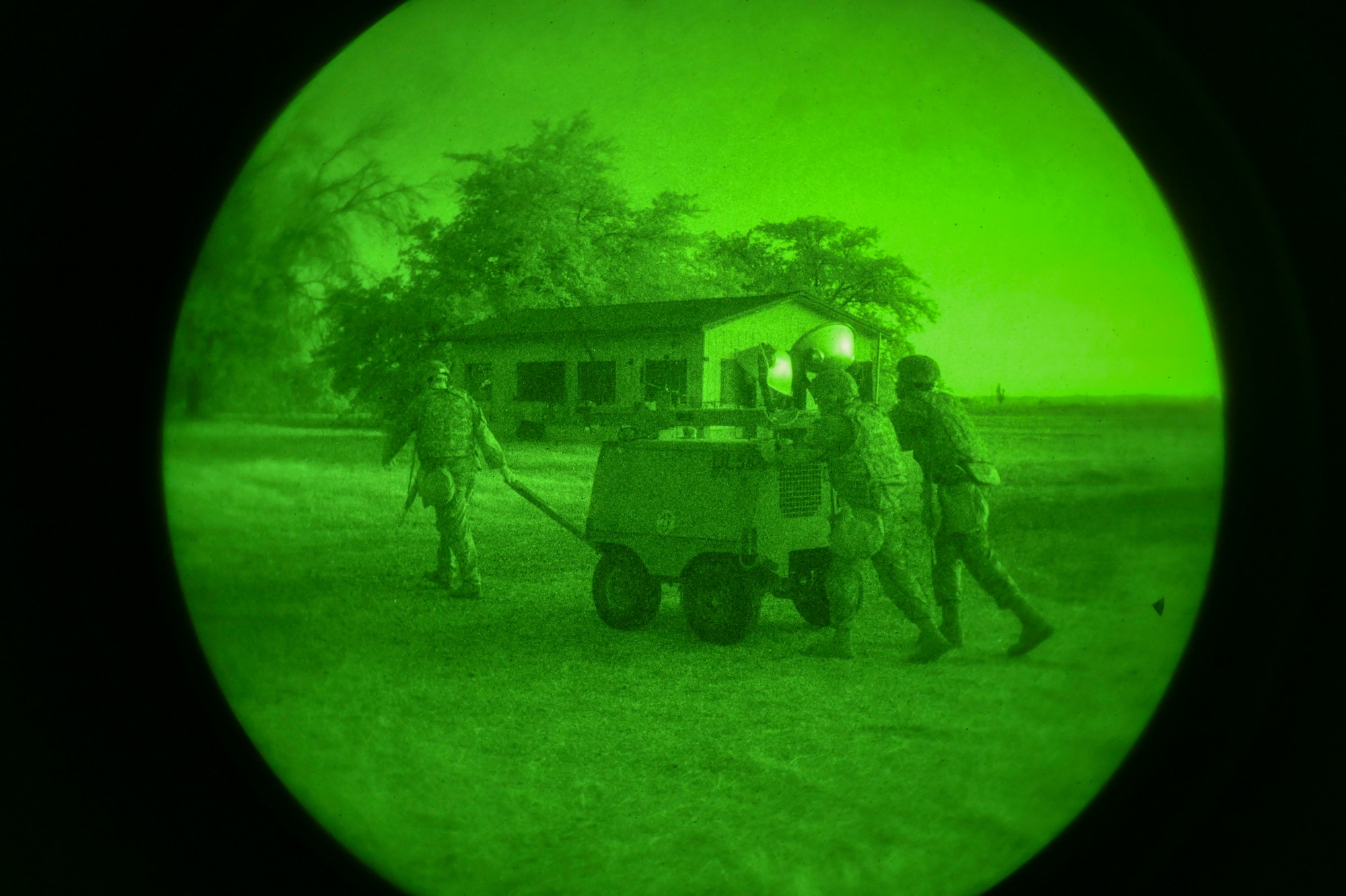 Airmen from the 9th Reconnaissance Wing set up lights for the night shift during Exercise READY DRAGON at Beale Air Force Base, California, June 3, 2024.