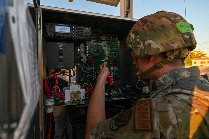 U.S. Air Force Senior Airman Joshua Cox, 9th Communications Squadron radio technician, inspects the giant voice during Exercise READY DRAGON at Beale Air Force Base, California, June 4, 2024.