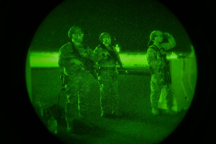 Airmen from the 9th Security Forces Squadron guard an entry control point during Exercise READY DRAGON at Beale Air Force Base, California, June 4, 2024.