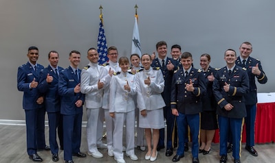 Service Members of the ATAMMC NCC Family Medicine Program are all smiles as they receive their diplomas during a graduation ceremony June 22, 2023.