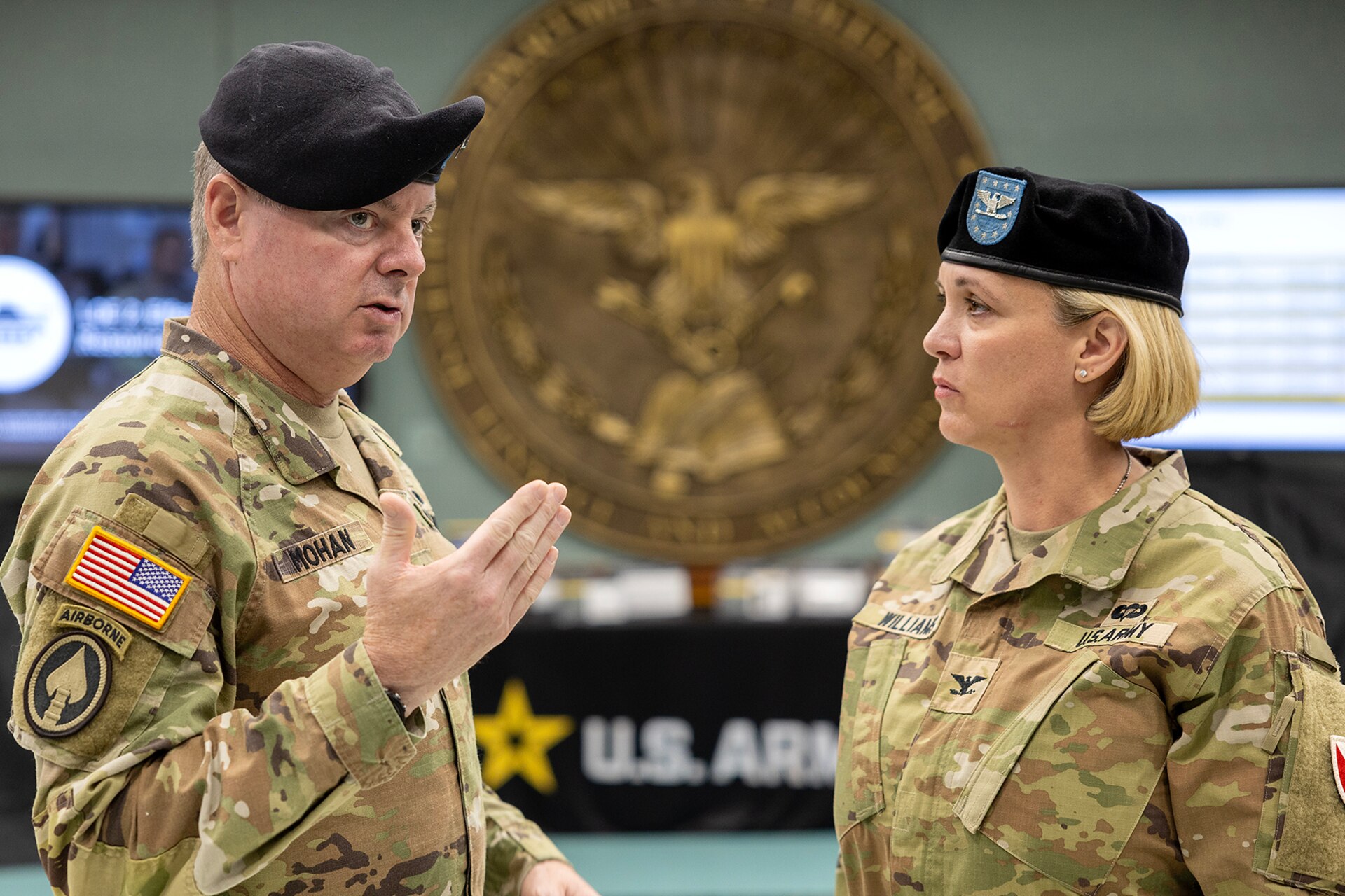 Lt. Gen. Christopher O. Mohan, U.S. Army Materiel Command deputy commanding general and acting commander, talks with Col. Michelle M. Williams, U.S. Army Financial Management Command commander, shortly after USAFMCOM’s change of command ceremony at the Maj. Gen. Emmett J. Bean Federal Center in Indianapolis June 18, 2024. USAFMCOM delivers precision enterprise-wide financial operations to integrate, synchronize and sustain the battlefield through the Joint Strategic Support Area and directly supports the Office of the Assistant Secretary of the Army for Financial Management and Comptroller in their role as the principal advisor on all matters related to financial management and comptrollership. (U.S. Army photo by Mark R. W. Orders-Woempner)