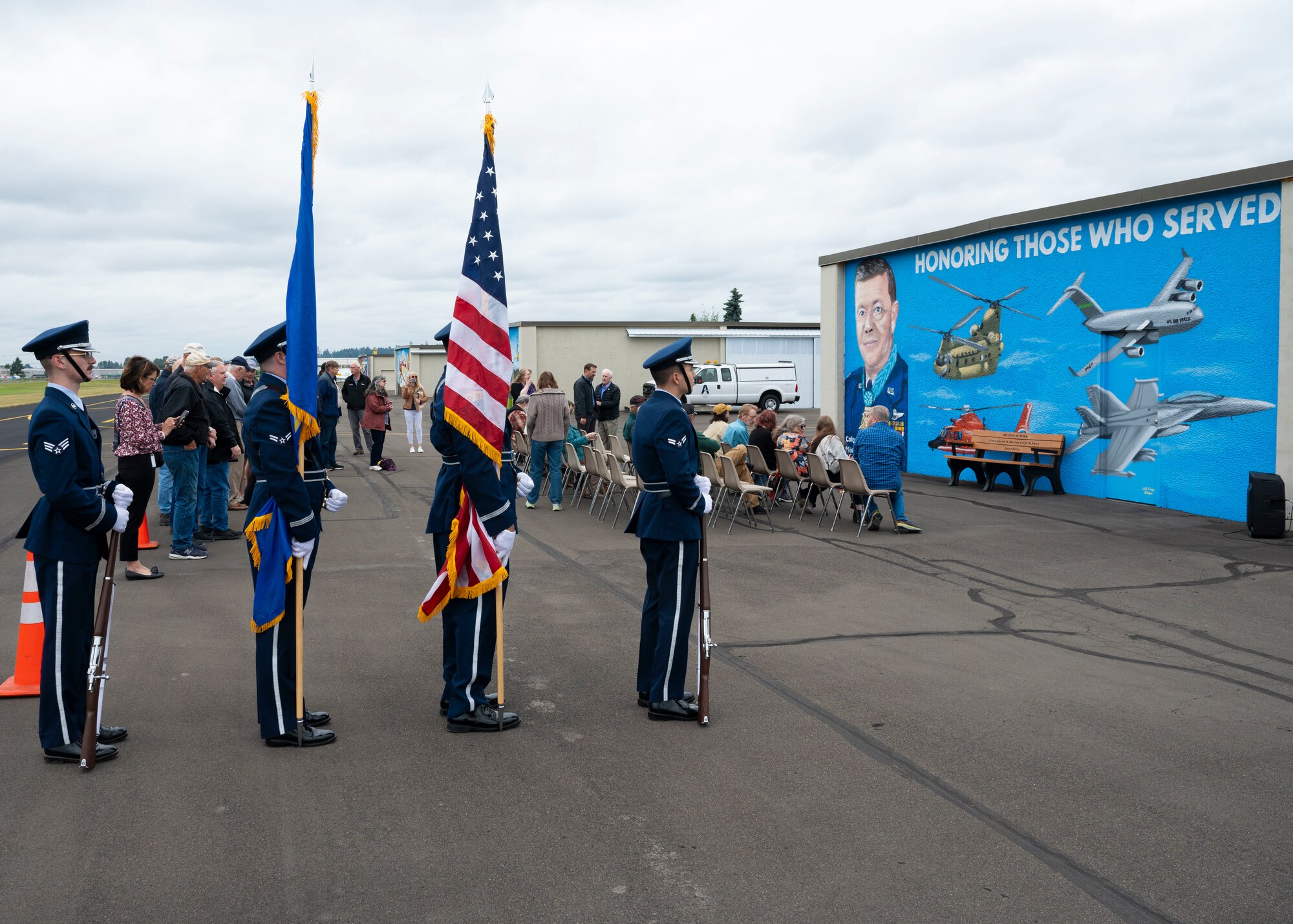 A dedication ceremony to unveil the new Col. Joe Jackson mural and bench was held at Auburn Municipal Airport, Washington, June 17, 2024. The ceremony honored Jackson, his family who were present at the event and those who have served. Jackson was awarded the Medal of Honor by President Lyndon B. Johnson for his efforts in saving three Airmen in an evacuation during the Vietnam War.