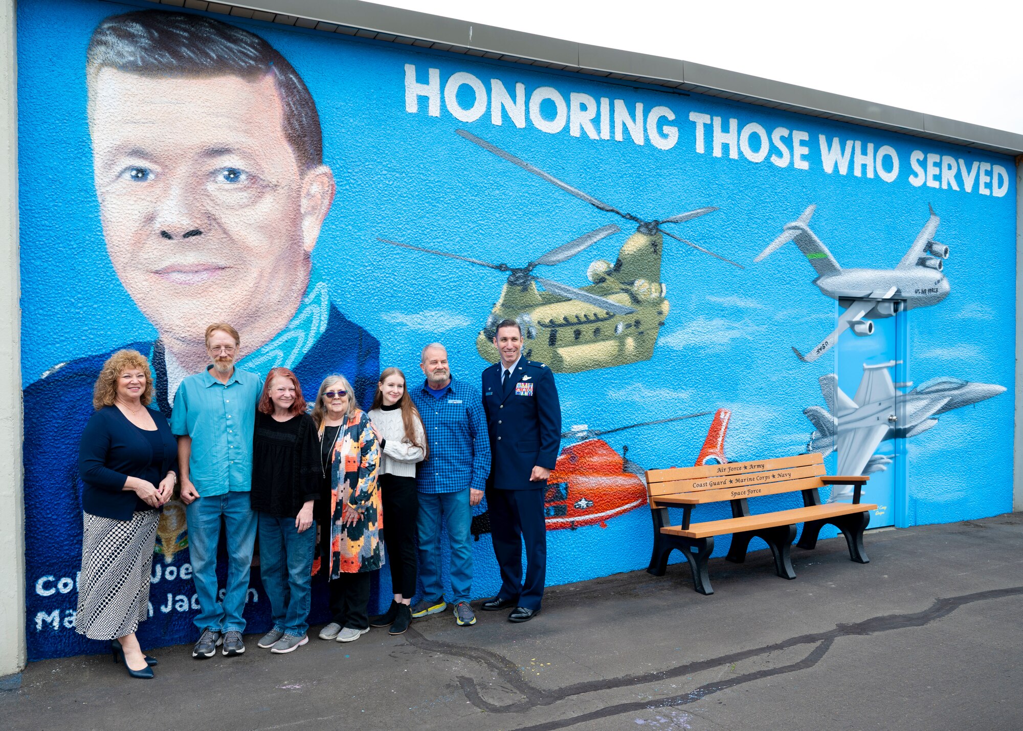 A dedication ceremony to unveil the new Col. Joe Jackson mural and bench was held at Auburn Municipal Airport, Washington, June 17, 2024. The ceremony honored Jackson, his family who were present at the event and those who have served. Jackson was awarded the Medal of Honor by President Lyndon B. Johnson for his efforts in saving three Airmen in an evacuation during the Vietnam War.