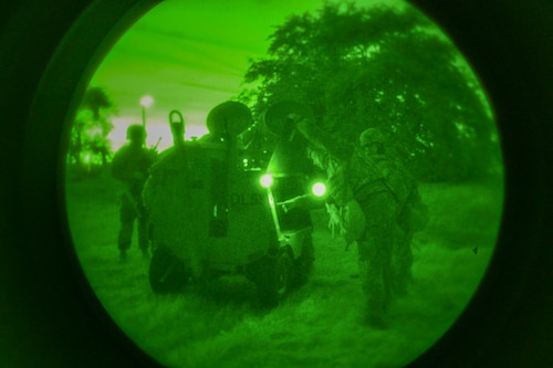 Airmen from the 9th Reconnaissance Wing set up lights for the night shift during Exercise READY DRAGON at Beale Air Force Base, California, June 3, 2024.