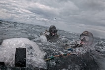 U.S. Navy Explosive Ordnance Disposal (EOD) technicians assigned to Explosive Ordnance Disposal Mobile Unit (EODMU) 2 and maritime EOD technicians from the Royal Netherlands Navy conduct floating mine response drills as part of EOD's mine countermeasure capabilities in the Baltic Sea off the coast of Putlos, Germany, June 13, 2024.