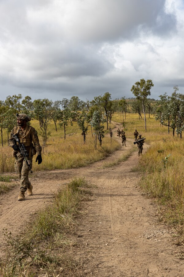 U.S. Marines with Golf Company, 2nd Battalion, 5th Marine Regiment (Reinforced), Marine Rotational Force – Darwin 24, patrol during Exercise Southern Jackaroo at Townsville Field Training Area, Queensland, Australia, May 30, 2024. Members of MRF-D 24.3 deployed to Townsville Field Training Area, QLD, Australia to participate in Exercise Southern Jackaroo 24, a multilateral combined arms exercise held with capabilities and personnel from the Australian Army, U.S. Army and Marine Corps, Papua New Guinea Defence Force, and the Japanese Ground Self-Defense Force to increase interoperability with Allies and partners. (U.S. Marine Corps photo by Cpl. Manuel Rivera)