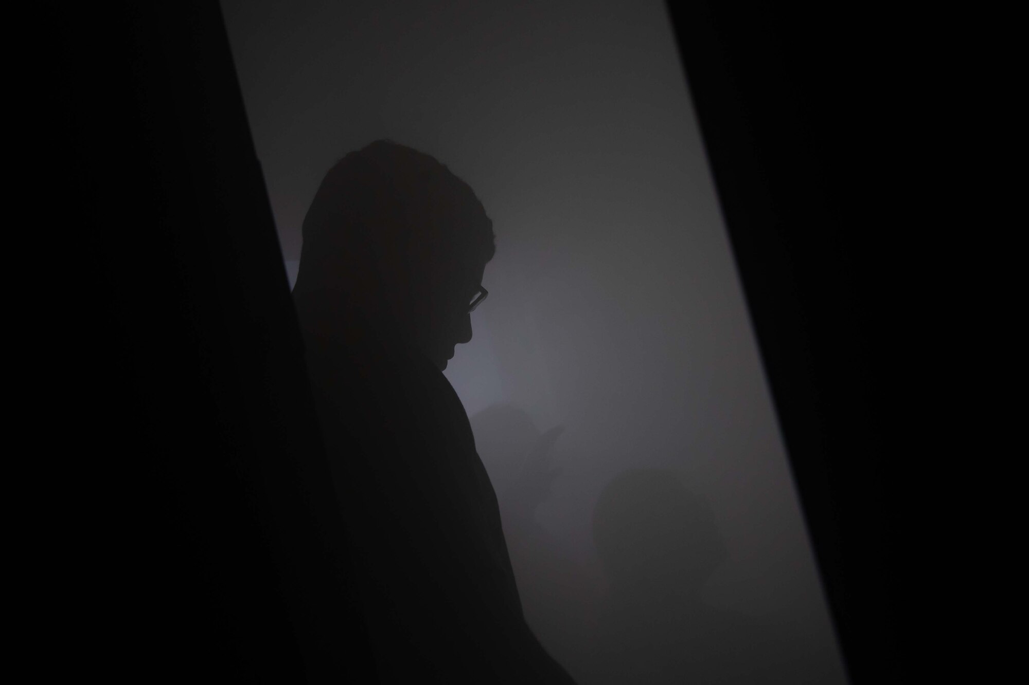 A man directs others in a training environment